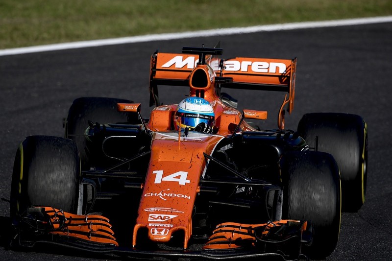 Alonso warned for slowing Hamilton up in Japanese GP lead battle