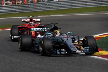 Belgian Grand Prix: Hamilton resists F1 title rival Vettel for win