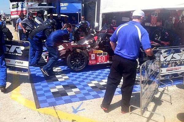 Michael Shank Racing crashes, crew member struck in pit road incident