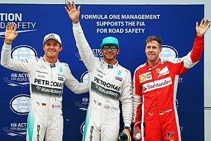 Hamilton takes Malaysian GP pole, as Vettel splits Mercedes