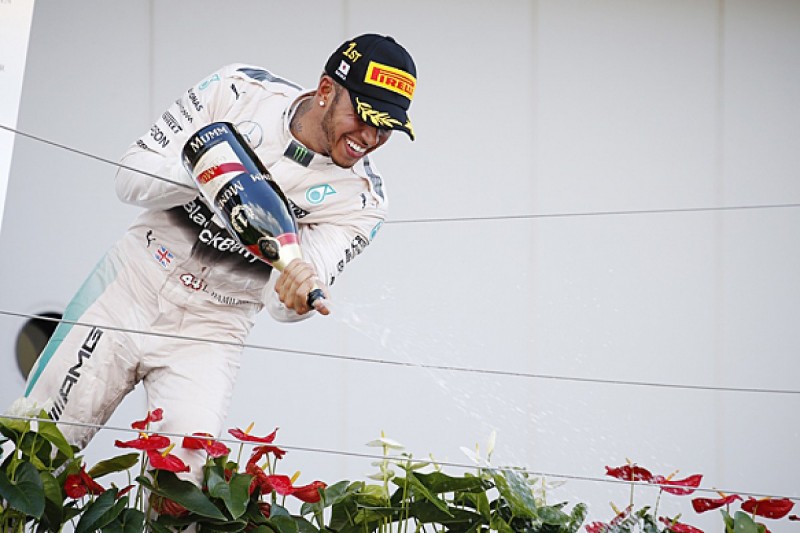 Japanese GP: Lewis Hamilton beats Nico Rosberg after first-lap dice