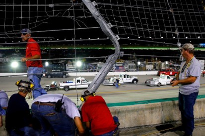NASCAR Truck race at Kentucky halted by catchfence-damaging crash