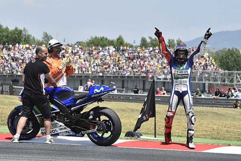 Barcelona MotoGP: Lorenzo fends off Rossi, Marquez crashes again