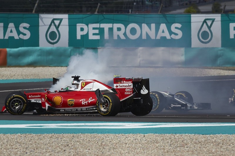 Ferrari F1 driver Vettel defends first-corner Malaysian GP move