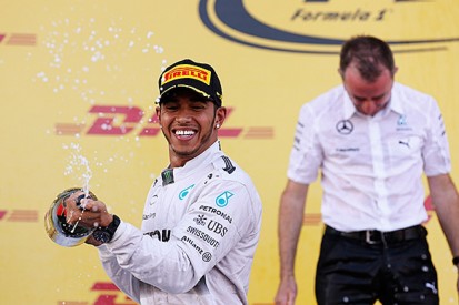 Russian GP: Lewis Hamilton cruises to win as Mercedes takes title