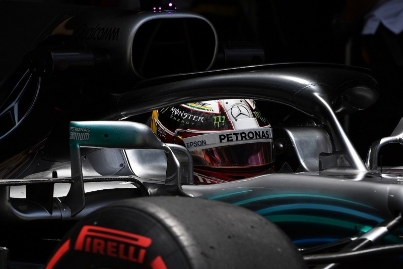 Lewis Hamilton against a Formula 1 calendar above 21 races