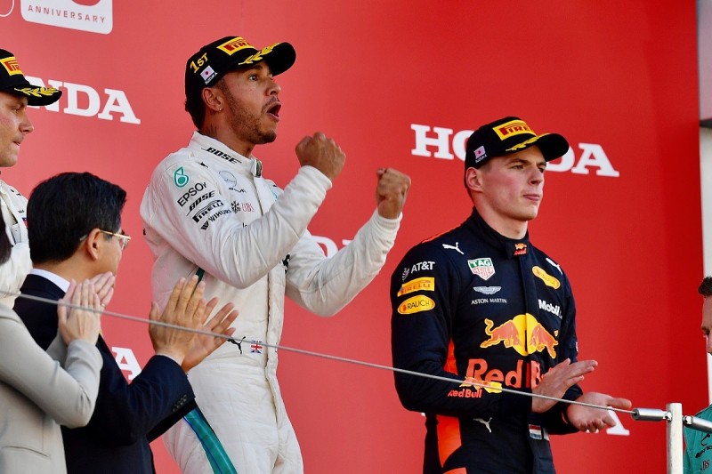 Japanese Grand Prix: Hamilton wins, Vettel clashes with Verstappen