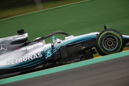 Belgian GP: Hamilton beats F1 title rival Vettel to pole in wet Q3