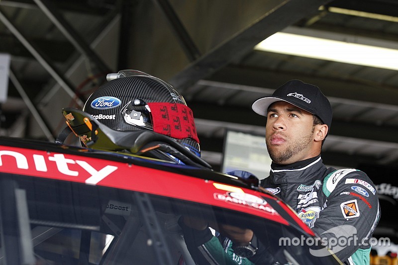 'Bubba' Wallace angry with teammate after they collide in fight for the win - video