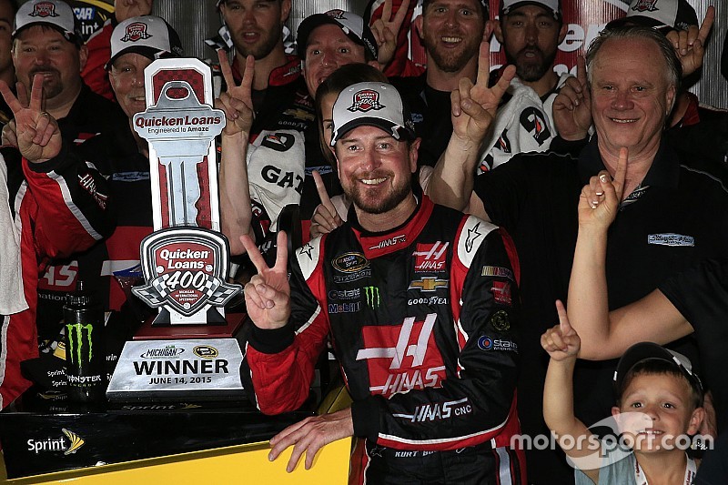 Kurt Busch survives a rain-soaked Michigan to earn the win