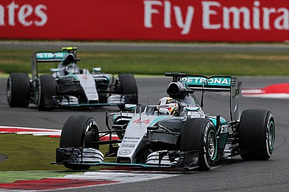 Hamilton claims emotional home win with Rosberg in second