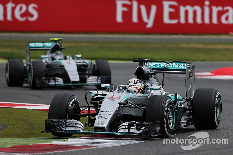 Hamilton claims emotional home win with Rosberg in second