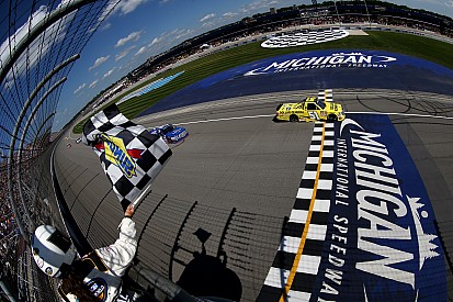 Busch battles back for first Michigan win