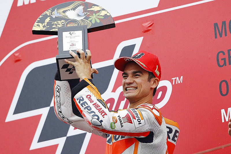 Dani Pedrosa vainqueur et "chanceux qu'il ait plu"