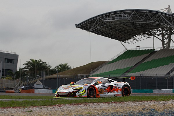 McLaren GT factory driver Rob Bell helps secure victory in the heat of Sepang