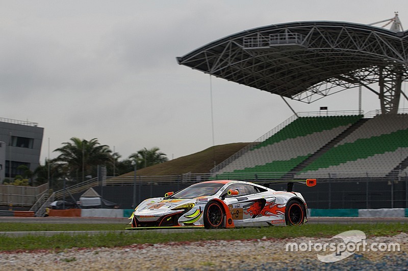 McLaren GT factory driver Rob Bell helps secure victory in the heat of Sepang