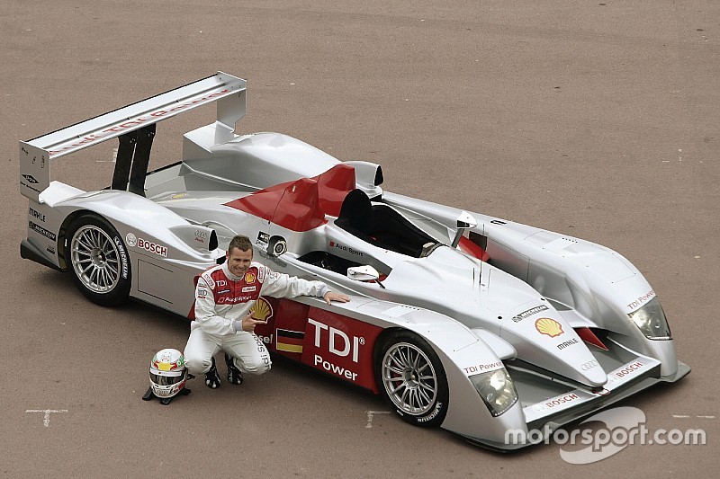 Tom Kristensen poses with the new Audi R10