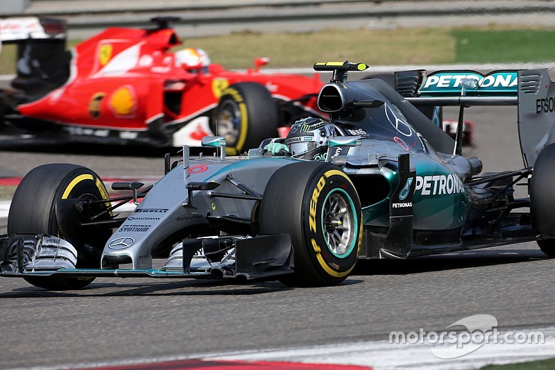 Nico Rosberg, Mercedes AMG F1 Team, und Sebastian Vettel, Scuderia Ferrari