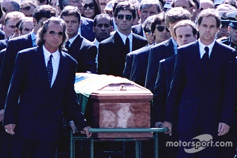 Emerson Fittipaldi, Jackie Stewart, Johnny Herbert, Derek Warwick, Gerhard Berger, Rubens Barrichello, Thierry Boutsen, Alain Prost and Damon Hill help lead the casket of Ayrton Senna during the funeral procession