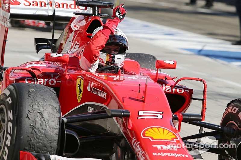 Race winner Sebastian Vettel, Ferrari SF15-T celebrates in parc ferme