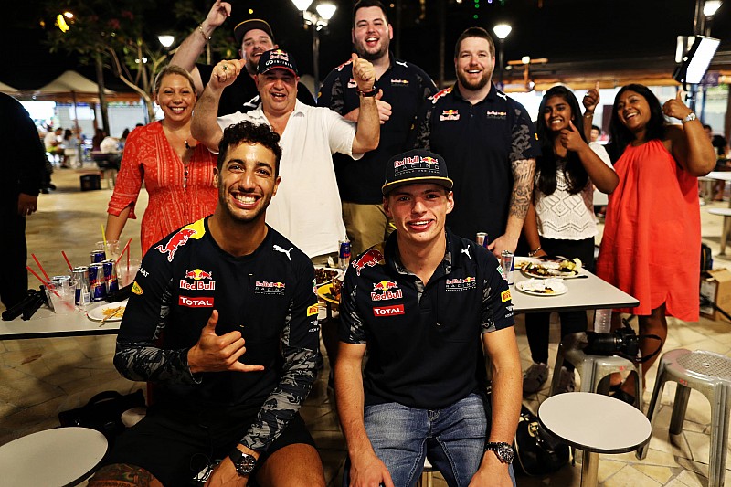 Daniel Ricciardo Red Bull Racing and Max Verstappen Red Bull Racing at Newton Food Centre