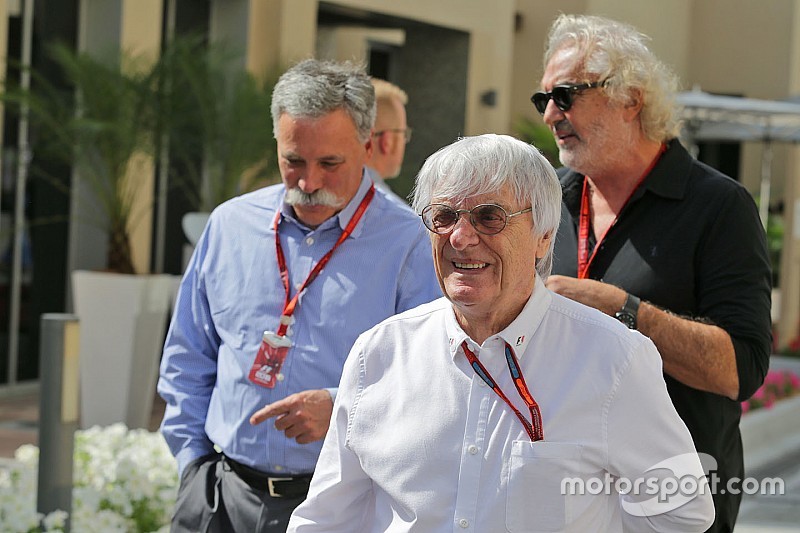 Bernie Ecclestone, with Chase Carey, Formula One Group Chairman and Flavio Briatore