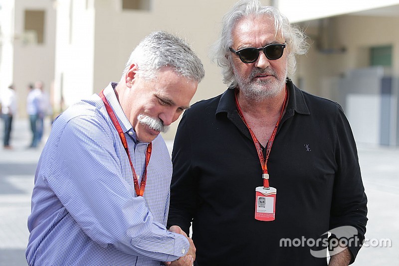 Chase Carey, presidente del Grupo de la Fórmula 1 con Flavio Briatore