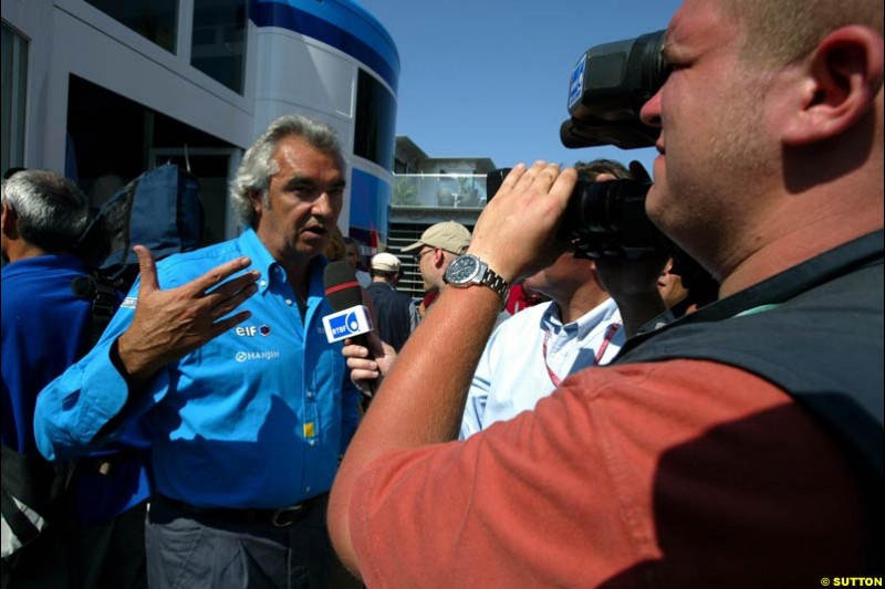 Renault boss Flavio Briatore comments on the team's 2003 drivers line up. Saturday, French Grand Prix, Magny Cours, France, July 20th 2002.