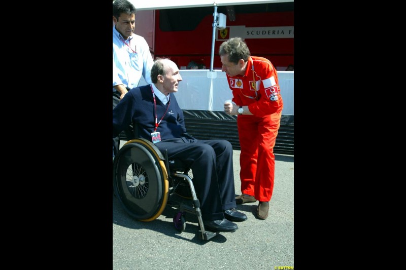 Frank Williams chats with Ferrari's Jean Todt. Saturday, French Grand Prix, Magny Cours, France, July 20th 2002.