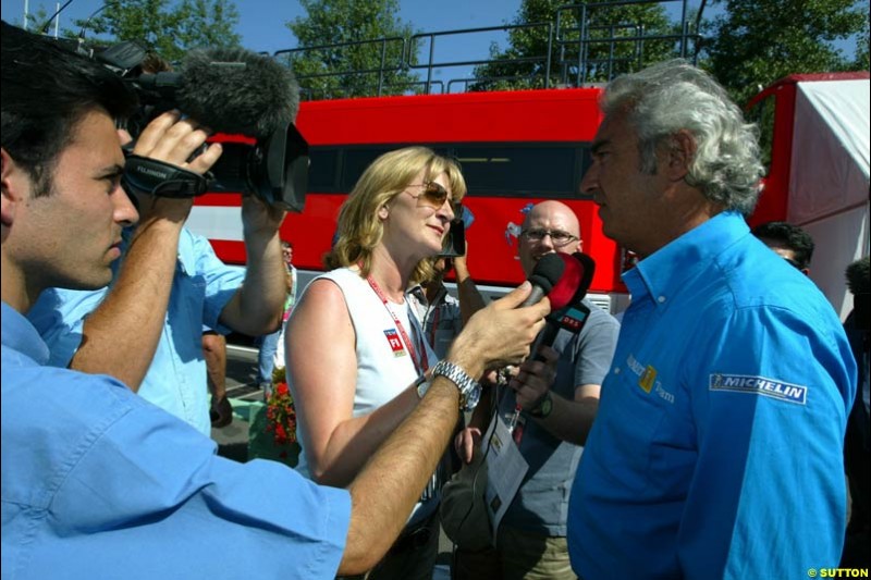 Renault boss Flavio Briatore comments on the team's 2003 drivers line up. Saturday, French Grand Prix, Magny Cours, France, July 20th 2002.