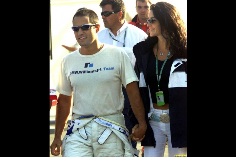 Juan Pablo Montoya and girlfriend Connie, after he set the 6th pole of the year. Qualifying, French Grand Prix, Magny Course, France, July 20th 2002.