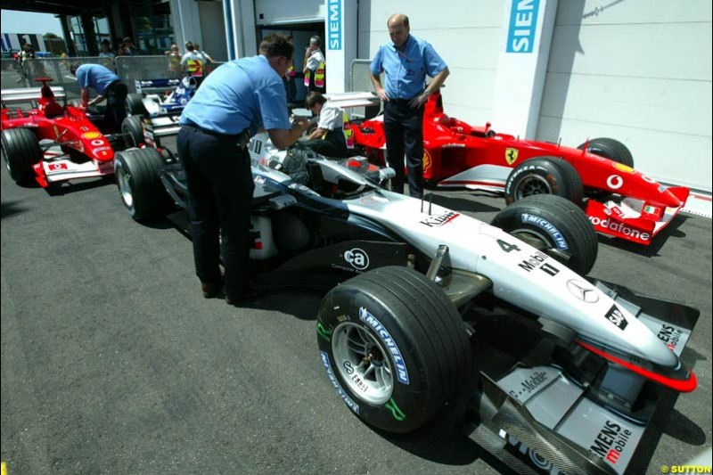 Parc Ferme, Qualifying for the French Grand Prix, Magny Cours, France, July 20th 2002.