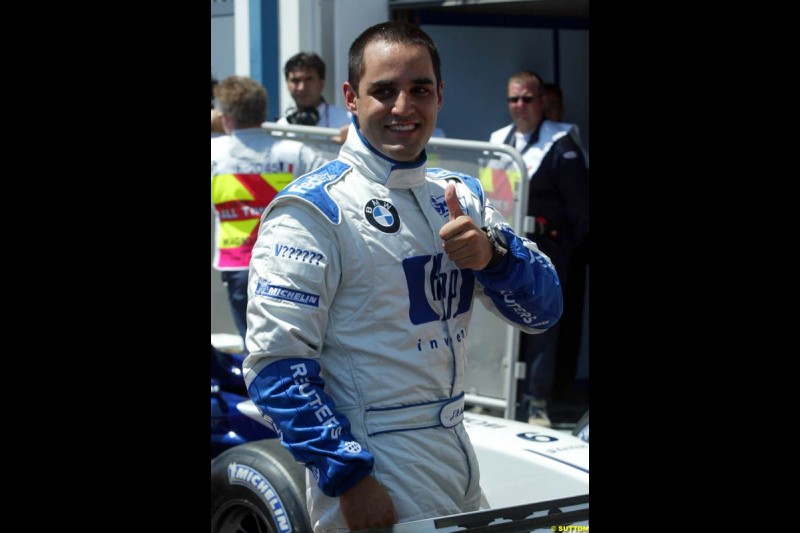 Juan Pablo Montoya after setting his 6th pole of the year. Qualifying for the French Grand Prix, Magny Cours, France, July 20th 2002.