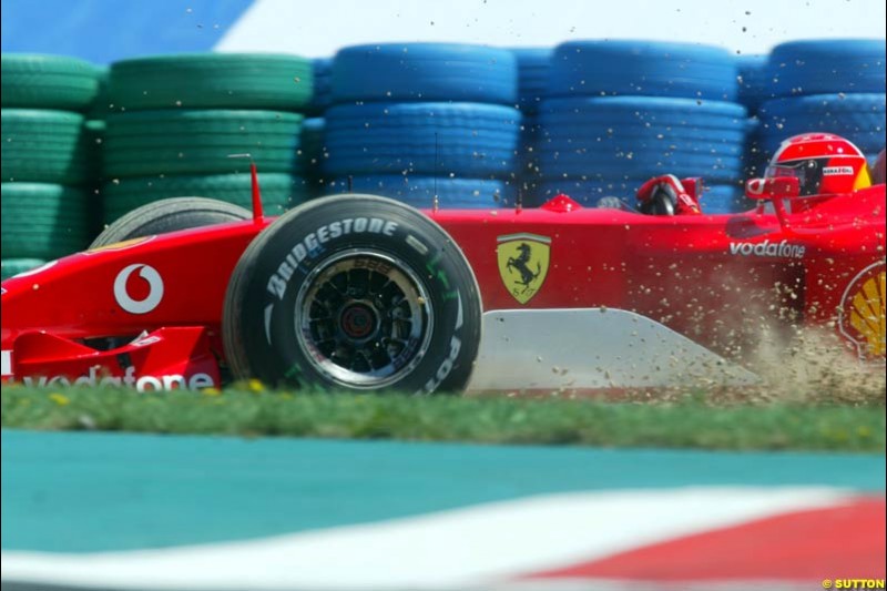 Michael Schumacher, Ferrari, makes a mistake. Qualifying for the French Grand Prix, Magny Cours, France, July 20th 2002.