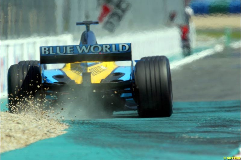Jarno Trulli, Renault, has a small off. Qualifying for the French Grand Prix, Magny Cours, France, July 20th 2002.