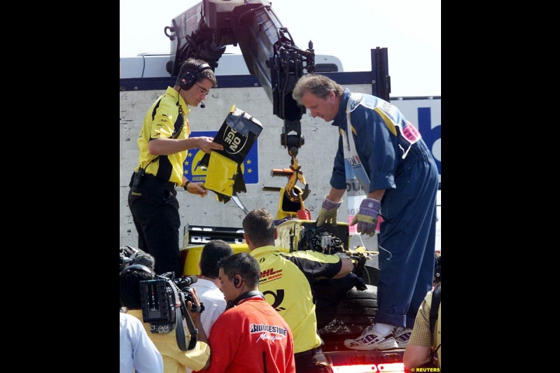 Giancarlo Fisichella's Jordan car brought back to the pits after his crash in Saturday Free Practice. French Grand Prix, Magny Cours, France, July 20th 2002.