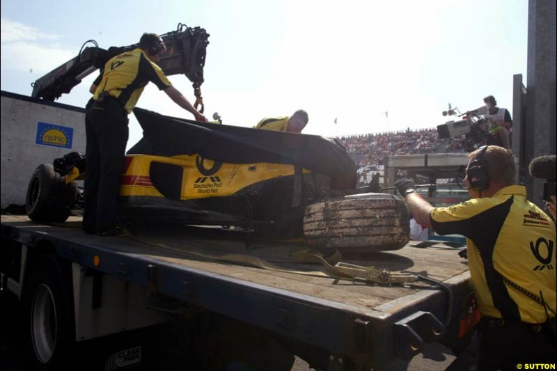 Jordan's Giancarlo Fisichella's car lifted after his crash. Saturday Free Practice, French Grand Prix, Magny Cours, France, July 20th 2002.