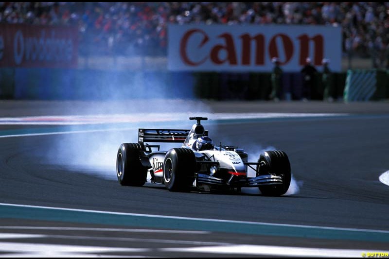 Kimi Raikkonen locks up. French Grand Prix, Magny Cours, France, July 21st 2002.