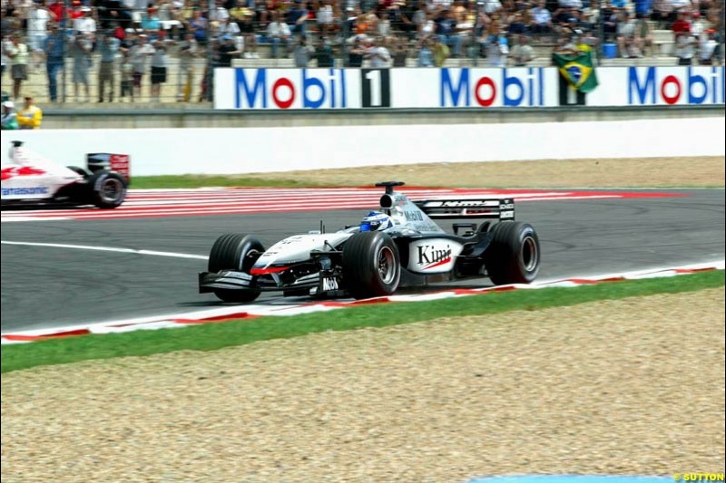 Kimi Raikkonen, McLaren, goes off the track and loses the lead. French Grand Prix, Magny Cours, France, July 21st 2002