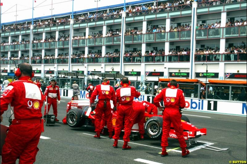 Rubens Barrichello stuck on the grid. French Grand Prix, Magny Cours, France, July 21st 2002. 
