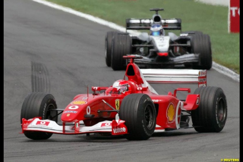 Michael Schumacher leads to win the French Grand Prix, Magny Cours, France, July 21st 2002. 
