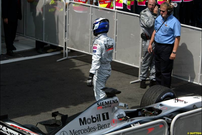 Kimi Raikkonen, McLaren, at parc ferme. French Grand Prix, Magny Cours, France, July 21st 2002.