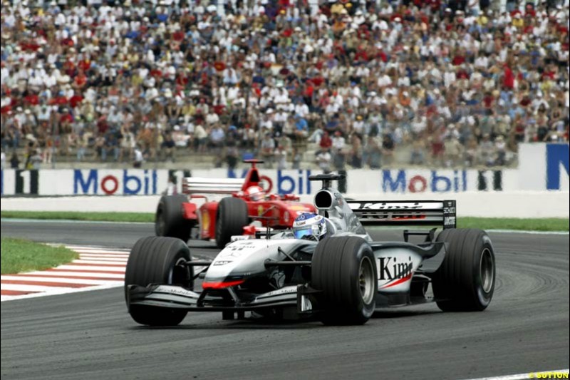 Kimi Raikkonen, McLaren, French Grand Prix, Magny Cours, France, July 21st 2002.