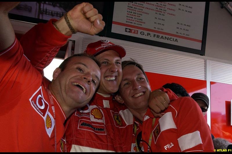 The entire Ferrari team celebrate Michael Schumacher's 5th WC. French Grand Prix, Magny Cours, France, July 21st 2002.