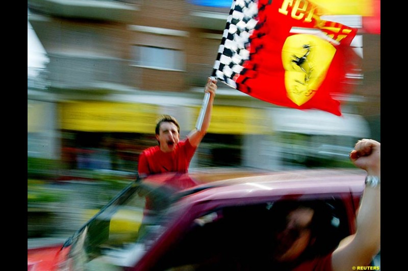 Fans celebrate Michael Schumacher's fifth WC. French Grand Prix, Magny Cours, France, July 21st 2002.