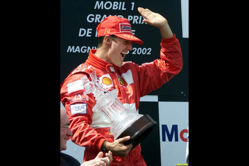 Michael Schumacher, Ferrari, secures his 5th World Championship with a win at the French Grand Prix, Magny Cours, France, July 21st 2002.
