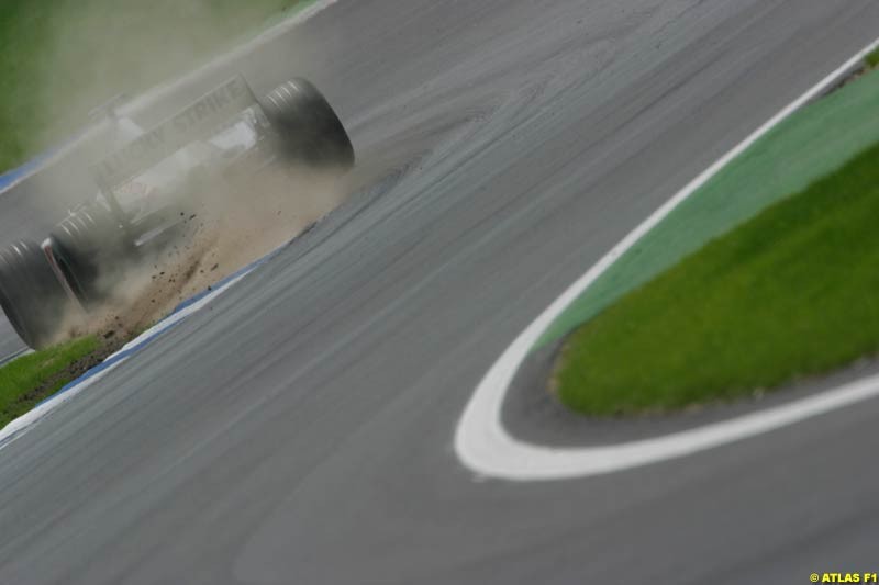 A British American Racing driver rides the curb. German Grand Prix, Hockenheim, Germany, July 27th 2002.