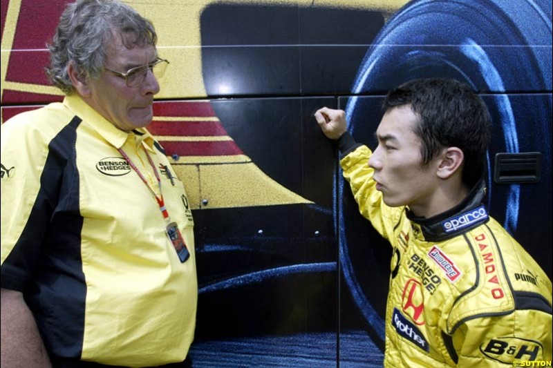 Gary Anderson, Jordan designer, chats to Jordan driver Takuma Sato. German Grand Prix, Hockenheim, Germany, July 27th 2002.