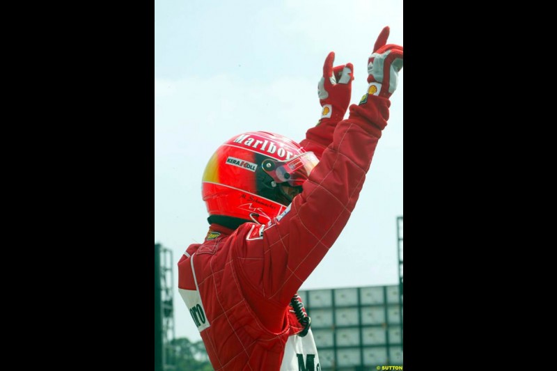 Michael Schumacher, Ferrari, celebrates claiming Pole Position in Qualifying. German Grand Prix, Hockenheim, Germany, July 27th 2002.