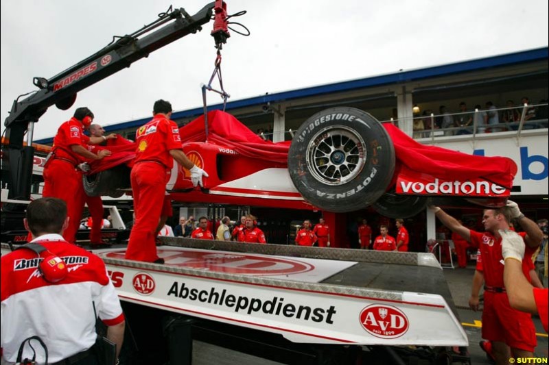 Rubens Barrichello's Ferrari arrives back at the pits during Saturday Free Practice. German Grand Prix, Hockenheim, Germany, July 27th 2002.